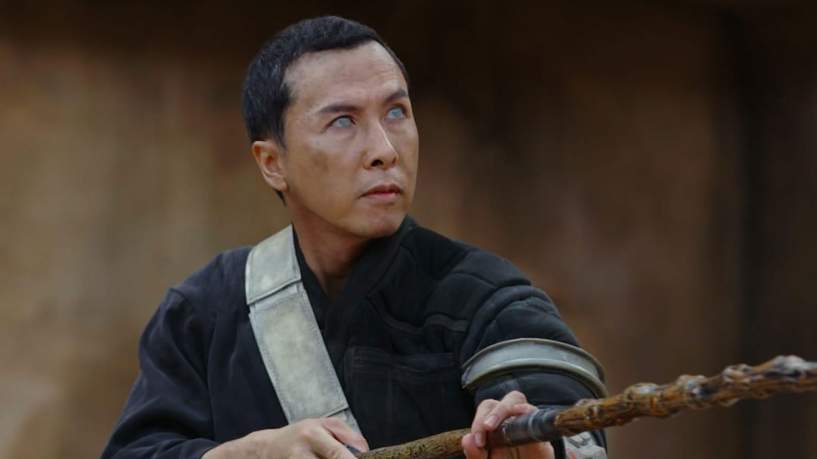 Chirrut Imwe with his bow staff